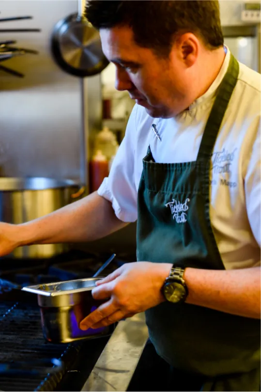 Chef cooking at The Tickled Trout